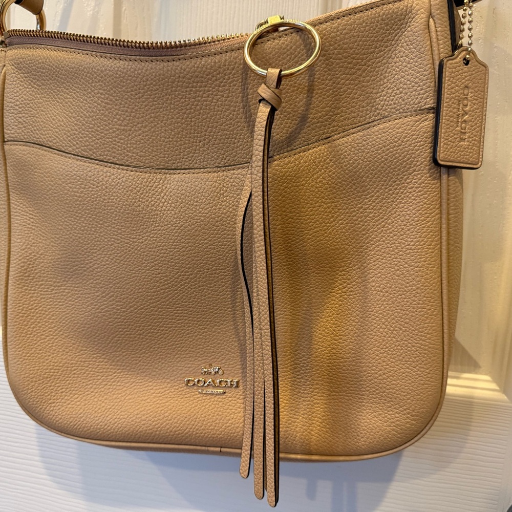 Coach Beige/Tan Pebbled Leather Crossbody Bag with Tassel